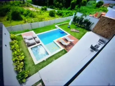 Casa de Condomínio com 4 quartos em Jardim Santa Rita