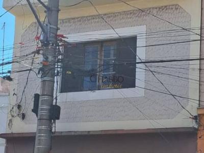 Sobrado com 4 quartos em Centro